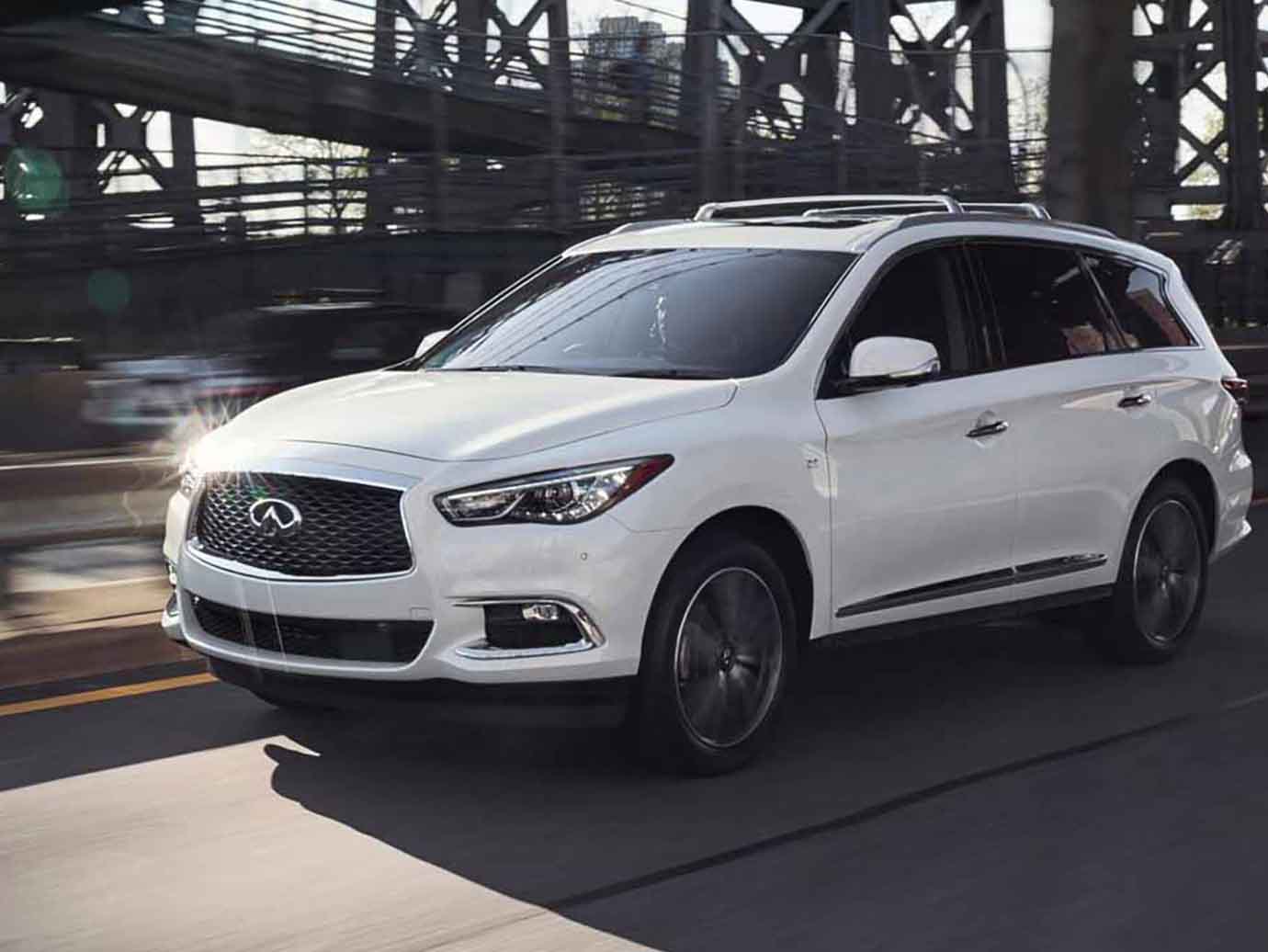 White Infiniti driving White Infiniti driving
