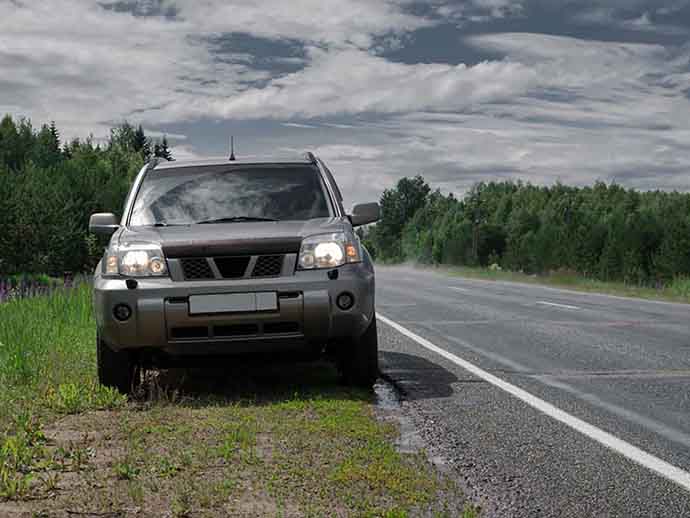 Nissan pulled over to the side of the road Nissan pulled over to the side of the road