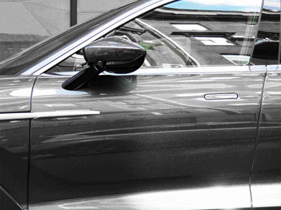 Close up to grey Aston Martin door