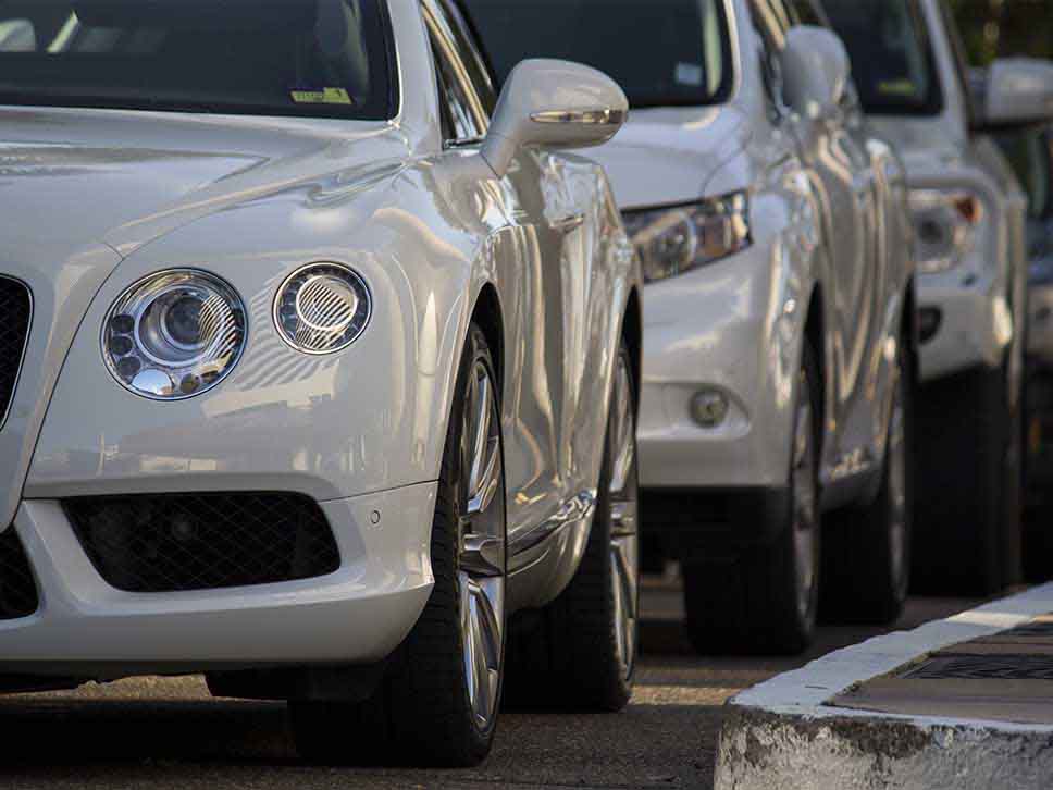 White Bentley in traffic