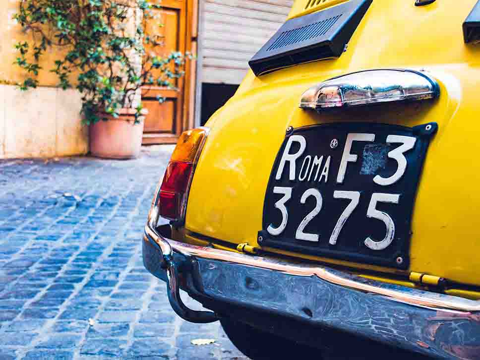 Yellow vintage Fiat rear