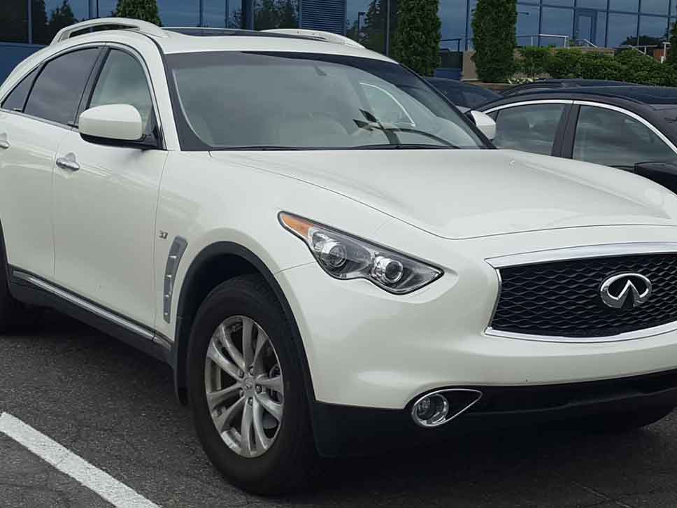 Infiniti QX70 parked in a parking spot