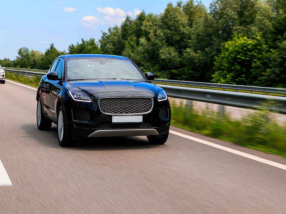 Jaguar suv driving on motorway
