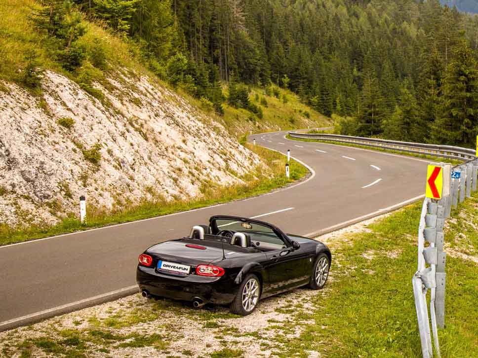 Mazda pulled over to the side of a mountain road