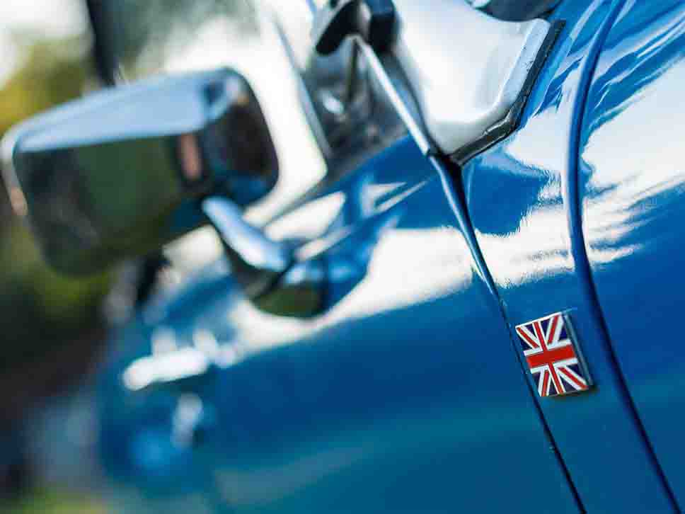 Union Jack badge on blue vintage MG