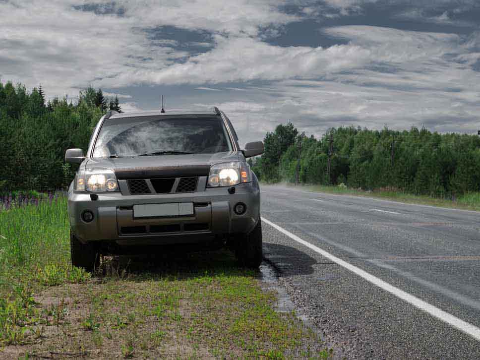Nissan pulled over to the side of the road