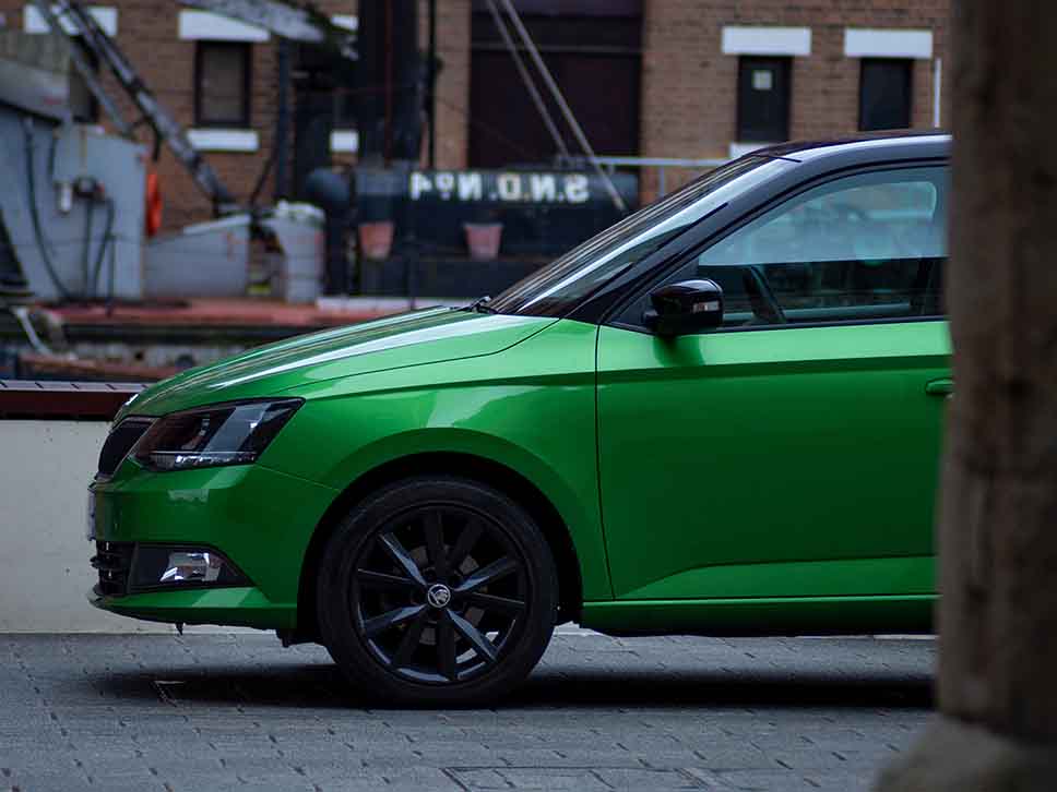 Green Skoda front side profile